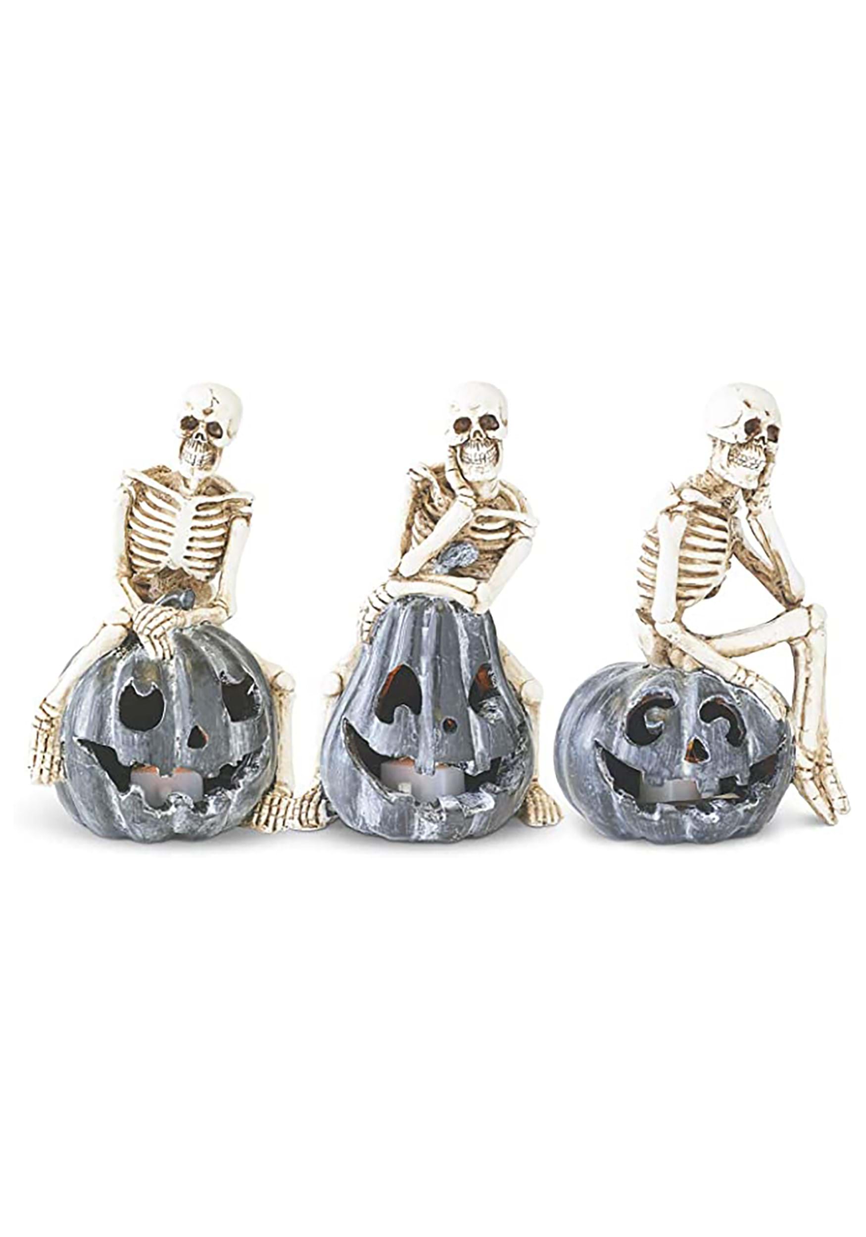 Set of 3 Skeletons Sitting on LED Jack ‘O Lantern Decoration